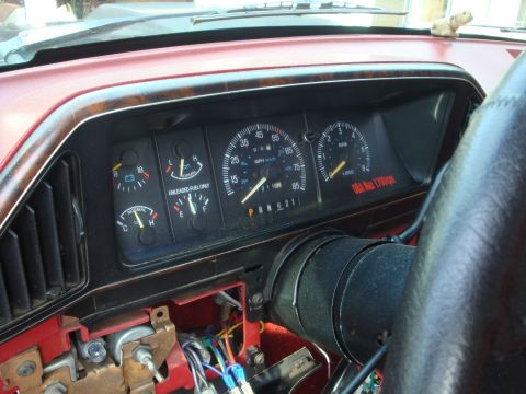 1989 Ford Bronco - The dashboard of a 1989 Ford Bronco displays various gauges, including the speedometer and tachometer.