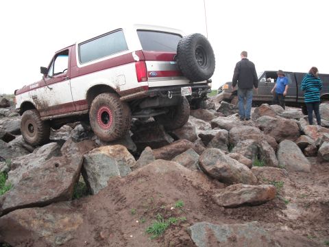 1991 Ford Bronco - This 1991 Ford Bronco navigates a challenging rocky terrain during an off-road event.