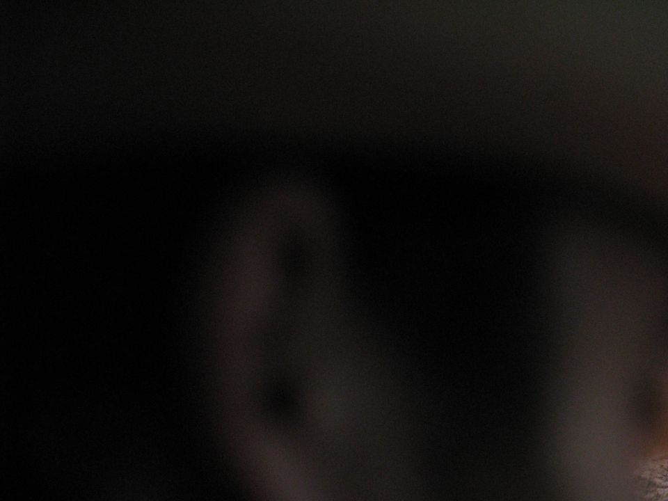Dark interior shot of a vehicle with a watermark at the bottom right