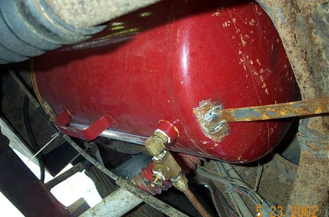 1986 Ford Bronco - Tank tilted forward w/pitcock on bottom to drain the moisture.