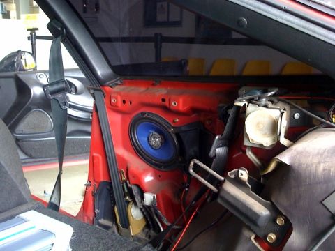 1994 Ford Probe - I replaced the rear factory speakers with Infinity 6x9's.