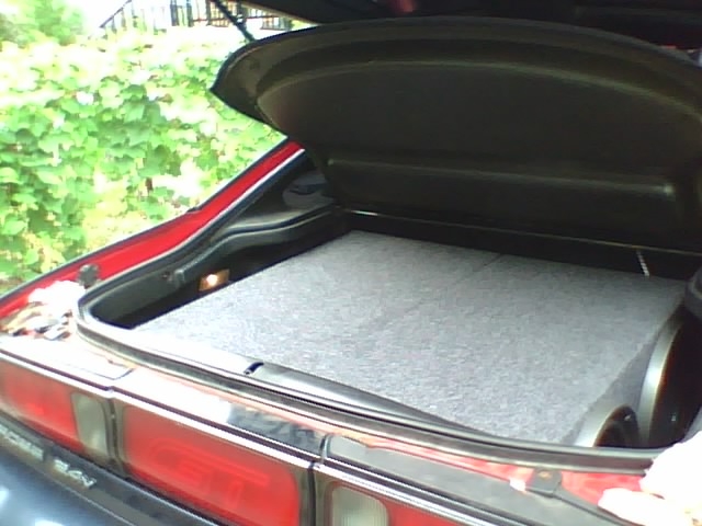 4 Kenwood 12" subs [in 2 separate sealed sub enclosures]. passengerside view.