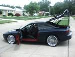 1994 Ford Probe - I had the car painted Hyundai Blue, but left the door, hood, and hatch wells red! Driver side view.