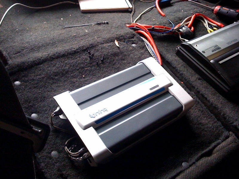 Installation of 2-Kenwood 1800 watt [class D] mono amps and 1-Infinity 4-channel amp [to power the 4-12\\" Kenwood subs].