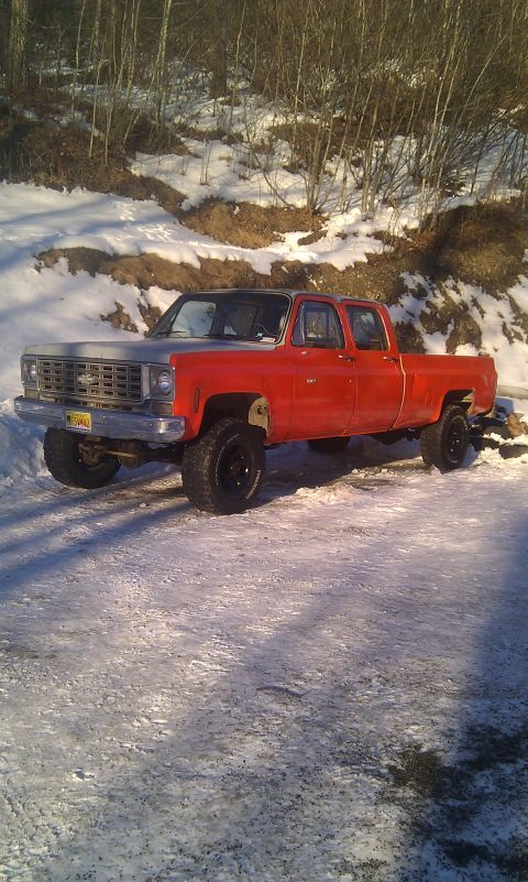 1990 Chevrolet Suburban - This pickup truck appears to be from the mid-1970s, not the 1990s as claimed.