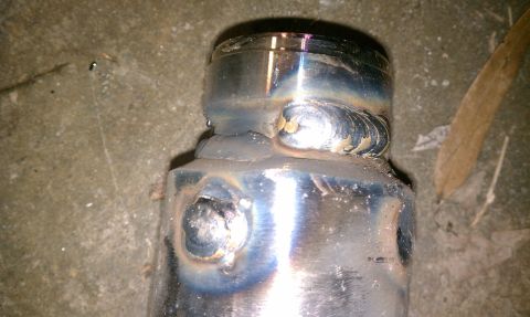1990 Ford Bronco - Close-up of a welded metal component, showing the texture and detail of the welding process.