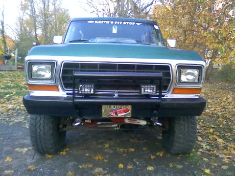 1979 Ford Bronco - Front view of a green Ford Bronco, likely a 1978 model, with custom accessories.