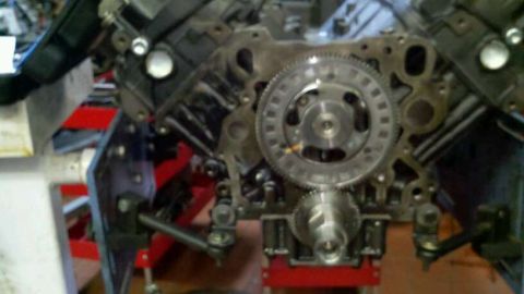 2002 Ford Excursion - This image shows the internal workings of an engine, focusing on the timing gears and associated parts.