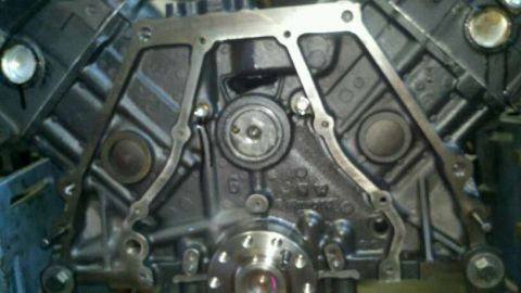 2002 Ford Excursion - Close-up of an engine block, showing internal components and gasket.