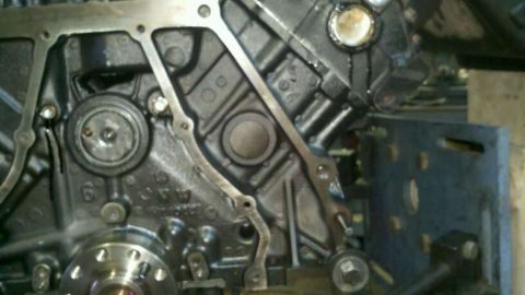 2002 Ford Excursion - Detail of an engine block, showing internal mechanical components and casting marks.
