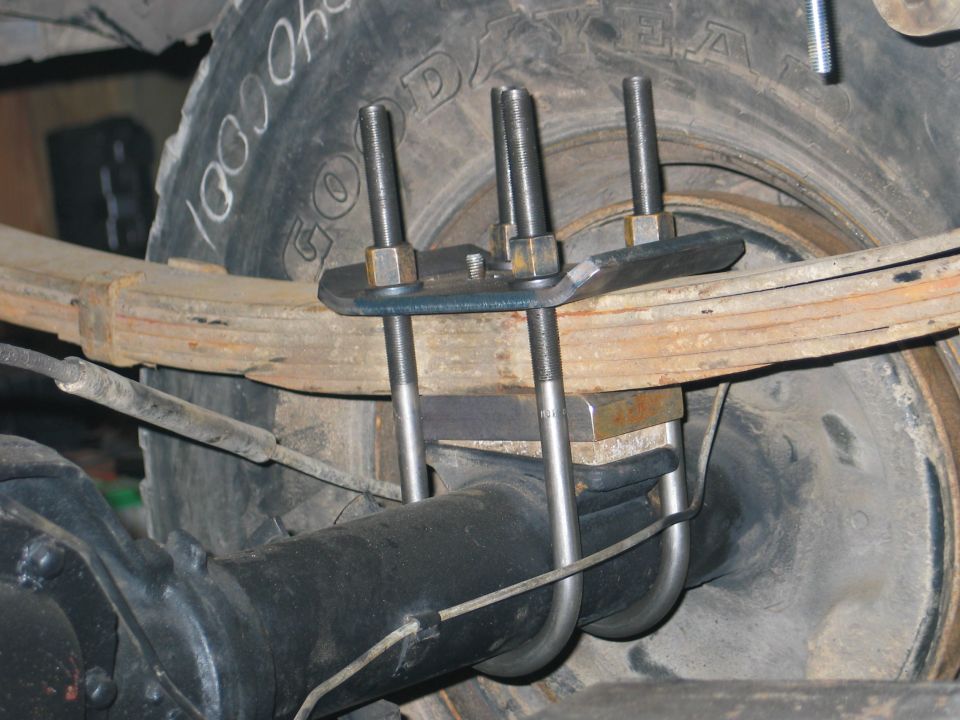 Leaf spring U-bolt modification on rear axle