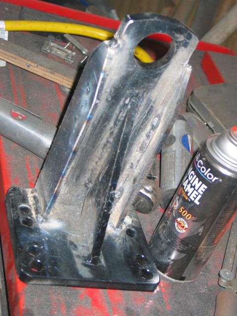 1984 Ford Bronco - Close-up of a custom welded metal bracket, likely for automotive use.