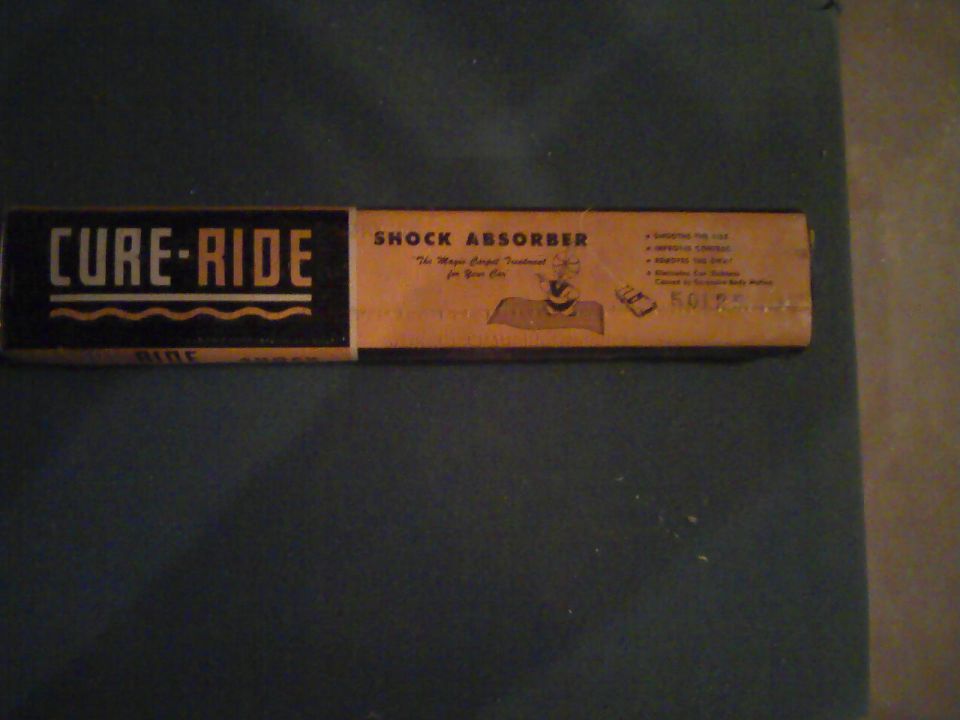 Cure-Ride Shock Absorber box with text and graphic