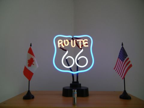 1999 Lincoln Town Car - A neon sign for Route 66 is displayed between Canadian and American flags.