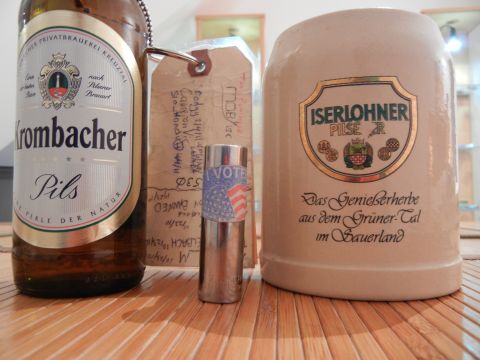 1999 Lincoln Town Car - A collection of beverages and tags sits on a wooden surface.