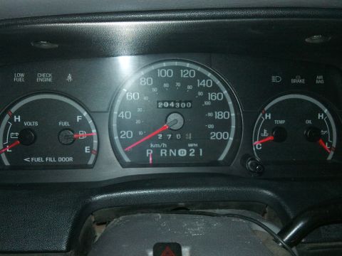1998 Ford Crown Victoria - The dashboard gauges show an odometer reading of 204,300 km/h and 270 mph.
