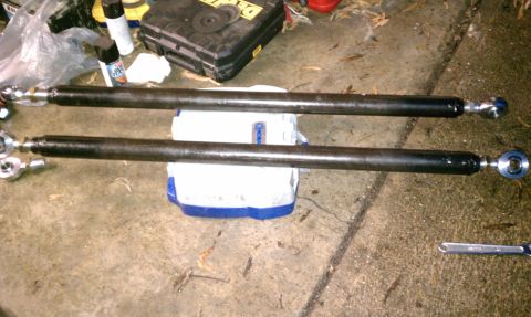 1990 Ford Bronco - These appear to be aftermarket suspension control arms, not original parts for a 1990 Ford Bronco.