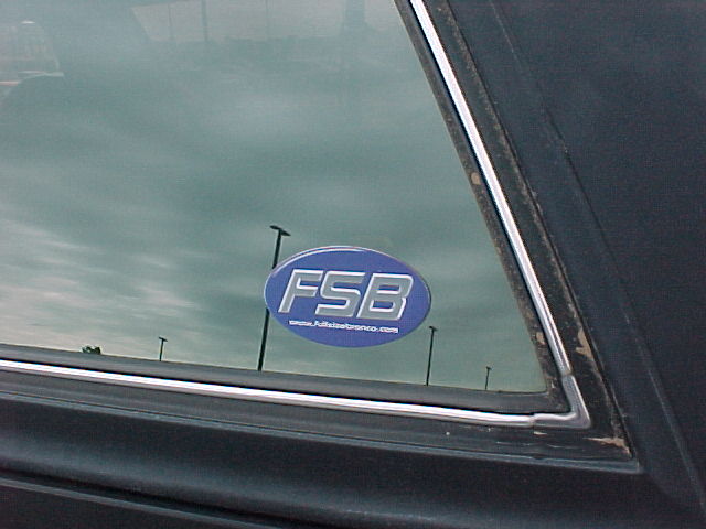 1993 Ford Bronco side window with FSB sticker and Supermotors.net logo