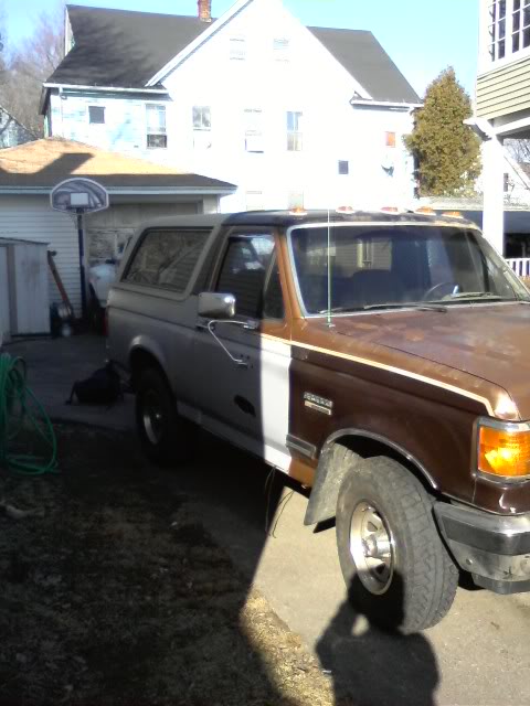1989 Ford Bronco - This 1989 Ford Bronco shows its two-tone paint job in a residential driveway.