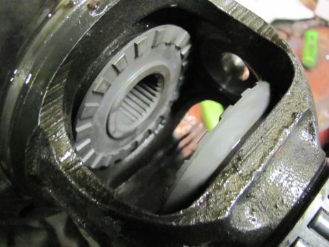 1989 Ford Bronco - Internal view of a greasy differential showing gears and splines.
