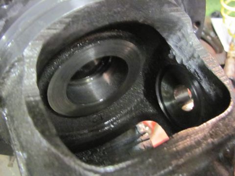 1989 Ford Bronco - Interior view of a differential housing, showing bearing races and internal components.