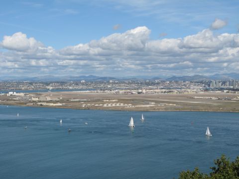 1971 Ford Ranchero - Several sailboats navigate the blue waters of San Diego Bay under a partly cloudy sky.