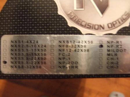 1996 Ford Bronco - Part identification plate lists various model numbers and names, including 'PRECISION OPTICS'.