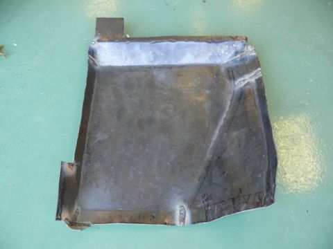 1976 Chevrolet Corvette - This metal component, likely a car part, shows signs of welding and hand-drawn markings.