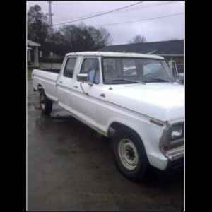 1995 Ford Bronco - This white pickup truck appears to be from the 1970s, not a 1995 Ford Bronco.