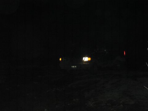 1981 Ford Bronco - A truck is visible at night with its headlights illuminated.