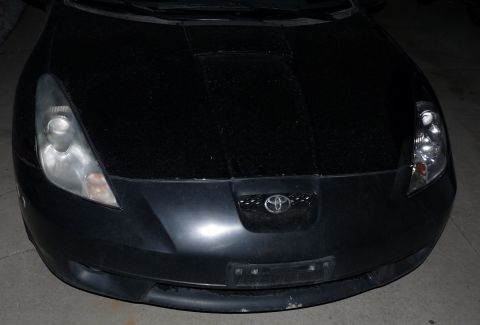 2006 Ford E350 - One light before cleaning, the other was already done