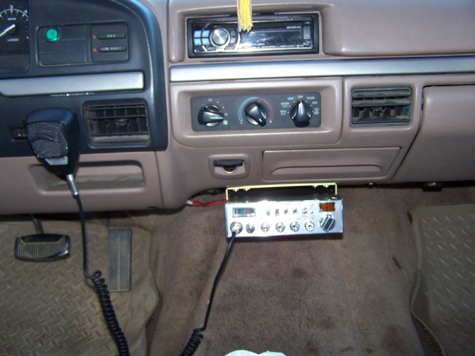 1992 Ford Bronco interior showing dashboard with CB radio and microphone