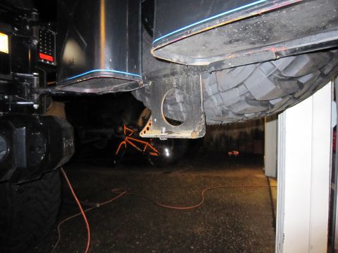 2008 Jeep Wrangler - Close-up view of a vehicle's undercarriage, focusing on the tire and suspension system.