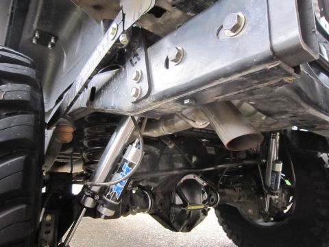 2008 Jeep Wrangler - Undercarriage view of a vehicle's rear axle, suspension, and exhaust system.