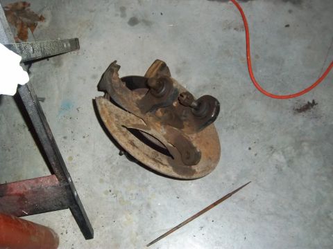 1989 Ford F-150 - This is a worn brake rotor and spindle assembly, not a 1989 Ford F-150.