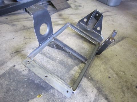 2008 Jeep Wrangler - Custom fabricated metal bracket, possibly for dual batteries or other vehicle component mounting.