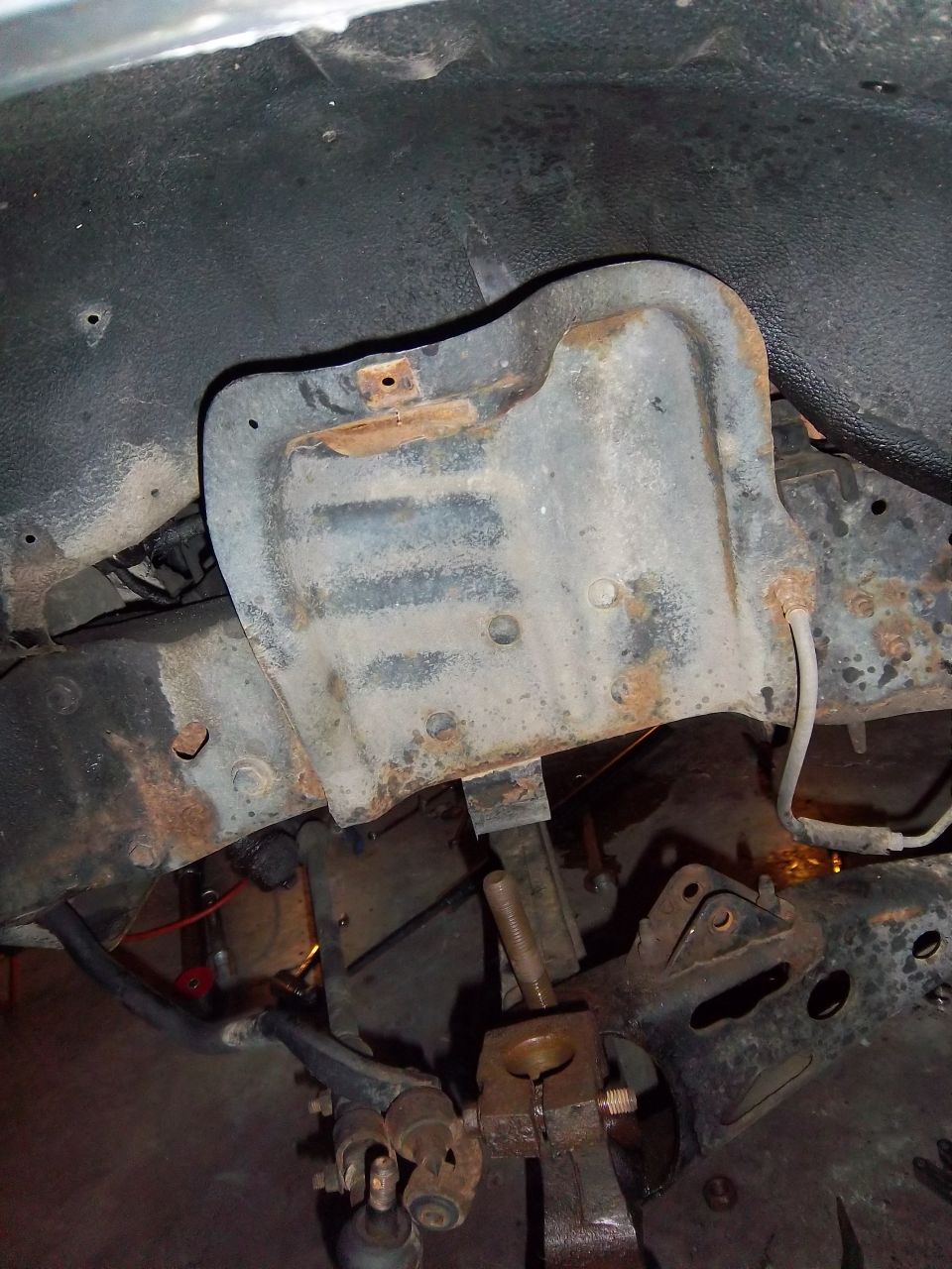 Suspension component with rust and wear