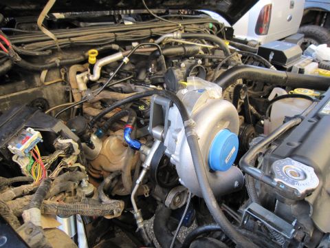 2008 Jeep Wrangler - Engine bay of a 2008 Jeep Wrangler showing a newly installed supercharger.