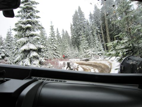 2008 Jeep Wrangler - Driving through a snow-covered forest road, the view from inside the vehicle shows a winter landscape.