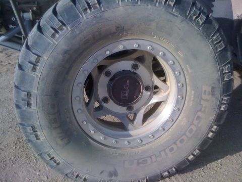 1968 Ford Mustang - Close-up of a BFGoodrich Mud Terrain tire and an aftermarket wheel.