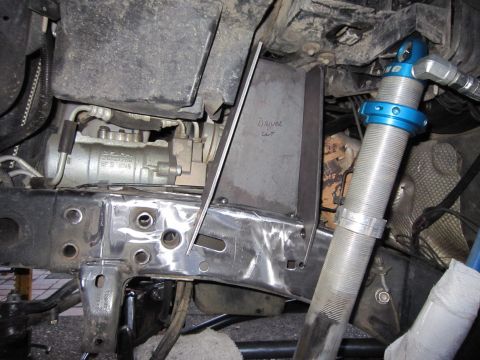 2008 Jeep Wrangler - Custom fabricated suspension mount with handwritten 'Davee cut' text, alongside a blue coilover shock absorber.