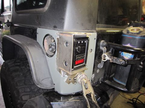 2008 Jeep Wrangler - Custom metal fabrication is being performed on the rear quarter panel of a Jeep Wrangler.