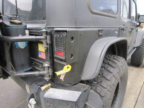 2008 Jeep Wrangler - Rear view of a 2008 Jeep Wrangler, equipped with a jerry can and custom taillight assembly.