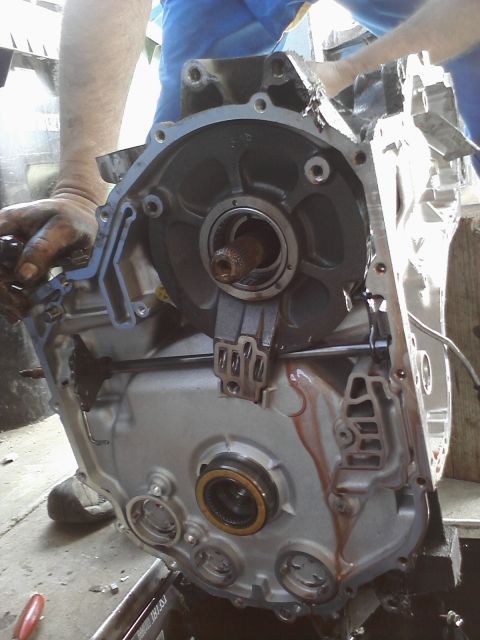 1993 Ford Taurus - Close-up view of a transmission component, showing internal gears and seals during a repair.