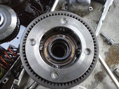 1993 Ford Taurus - A close-up view of a transmission planetary gear set, showing the intricate toothed ring and internal components.
