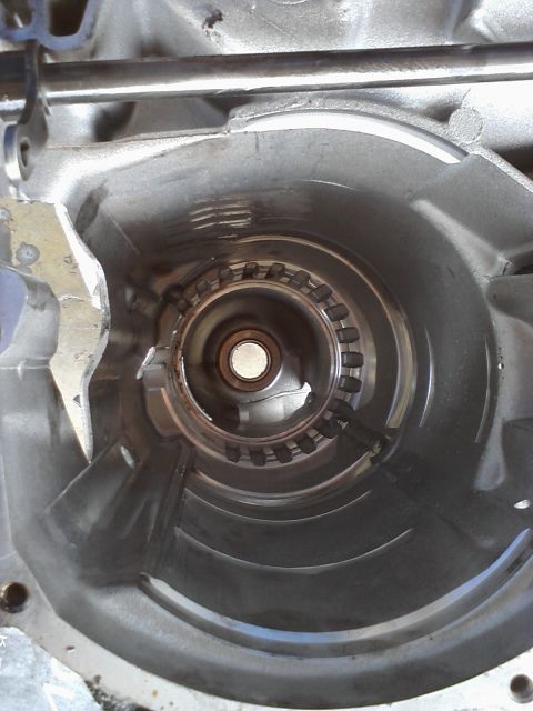 1993 Ford Taurus - Close-up view of the internal splines within a transmission torque converter housing.