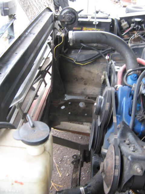 1972 Ford F-250 - Close-up view of an engine bay, showing various mechanical components and wiring.