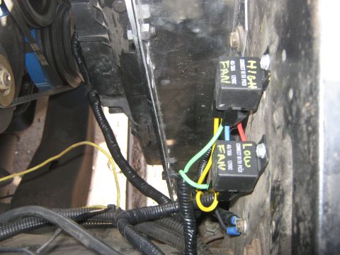 1972 Ford F-250 - Wiring harness and relays in an engine bay, labeled for fan control.