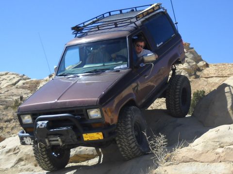 1986 Ford Bronco II - This 1986 Ford Bronco II is navigating a challenging rocky trail.