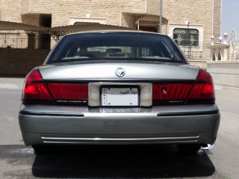 2001 Mercury Grand Marquis - Rear view of a silver 2001 Mercury Grand Marquis with a Kuwaiti license plate.